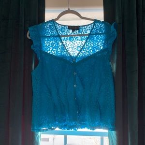 Adorable blue lace top with slight peplum.